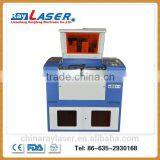 China CO2 SmallAcrylic Granite Stone Paper Fabric Laser Cutting Machine Price Cheap thumbnail-1