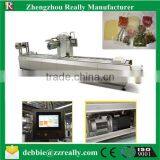 Continuing Vacuum Stretch Film Packing Machine Bread Stretch Vacuum Packing Machine