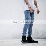 Slightly Faded Blue Jeans With Zip Down Whiskering Ripped Pants thumbnail-5