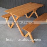 outdoor wooden picnic camping table and bench