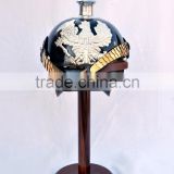 antique black german helmet