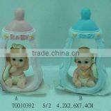 Polyresin Baby in Feeding Bottle thumbnail-1