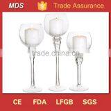 Cone shaped clear glass long stem candle holder cross                        
                                                Quality Choice