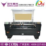 Guangzhou Hanniu 1300*900mm AK-1390T(Double head) co2 laser fabric cutting machine