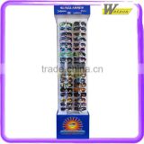 Retail cardboard optical frame display with plastic hook displays