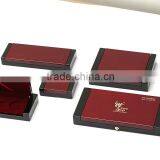 golden metal logo wooden coin box