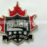 Self-adhesive embroidery patch