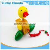 Colorful Pull Along Duck Wooden Toy as You Pull They Make a a Fun Baby thumbnail-4