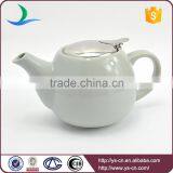 China supplier grey ceramic teapots wholesale with infuser basket