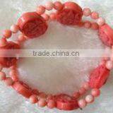 Wholesale 7" 15-20mm Pink Round and Carved Natural Coral Beaded Bracelet thumbnail-1