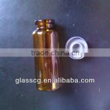 Amber glass bottle With rubber stopper and flip off cap