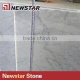 Marble Carrara Tiles Cut Into Marble Countertop thumbnail-6