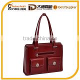 Elegant checkpoint-friendly solid color laptop bag with magnetic snaps for lady