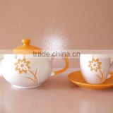 Handpainted ceramic tea pot and cup