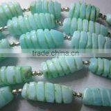 Peru Opal Carved Twisted Beads thumbnail-1
