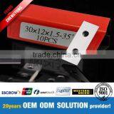 14.6x9x1.5mm Carbide Reversible Knives Since 1994