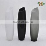 inclined tall colored glass vases