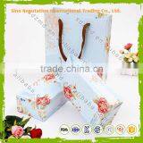 New Design Gift Famous Brand Printed Kraft Paper Bag thumbnail-3