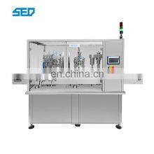 Nice Quality Automatic 4 Heads Glass Bottle Filling and Capping Machine thumbnail-1
