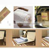 China Foshan NaiGu Factory Semi Automatic Mattress Roll Wrapping Machine thumbnail-2