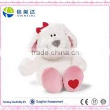 Cute fat plush dog/puppy with a red heart