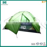 2 men green camping tent