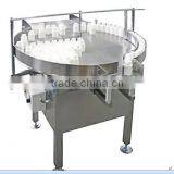 Rotating disc unscramble bottle machine