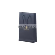 Custom black handbag with embossing gold logo string hand white paper bag with durable packaging high quality for gift packing
