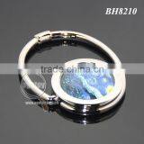 Round Shaped Starry Night Painting Portable Folding Alloy Purse Handbag Hook Metal Swivel Handbag Holder Shopping Bag Hanger thumbnail-2