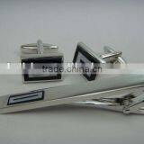 set of cuff links & tie bar