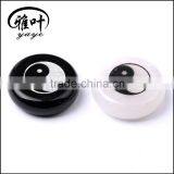 Wholesale Black and White Semi-precious Stone Engraved Yin Yang Feng Shui Round Palm Stone Set