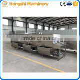 Plastic tray cleaning machine
