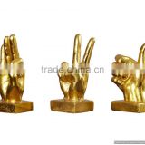 gold plated hand metal sculpture