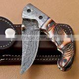 A SCENIC HANDMADE ENGRAVED CAMEL BONE HANDLE, DAMASCUS STEEL LINER LOCK FOLDING KNIFE