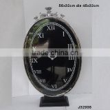 vertical oval shape steel Metal table clock on base in mirror polish other finishes available