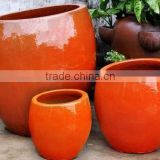 Set of 3 Orange ceramic pots,