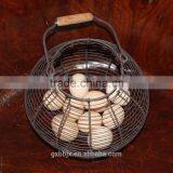 Oval metal wire storage basket with wooden handle