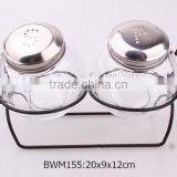 2pcs Round Glass Spice Jars With Metal Lid on a Metal Rack