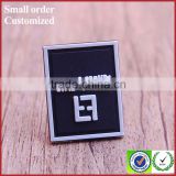 Private black embossed white logo organic pvc label tag for jackets shoes