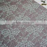 Elastic rose lace fabric in white