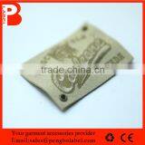 Eco-Friendly Embossed Printing Clothing China PU Leather Badge Label