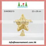 Christmas tree topper of gold star christmas decoration