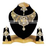 Fancy Intricate Design White Color Flower Gold Plated Kundan Zerconic Necklace Earrings Tikka