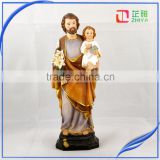 resin Saint Joseph with baby Jesus figurine
