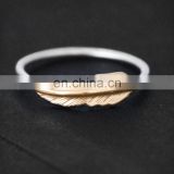 Custom gold and silver nautical feather rings