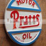 Manufacturer & Exporter of Round Cast Iron Wall Sign/ MOTOR PRATTS OIL Sign
