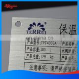 Chemically etched metal nameplate for machine