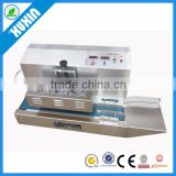 continuous electromagnetic induction sealing machine