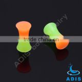 Double flared solid cartilage ear tunnel jewelry, green and orange