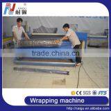 China Foshan NaiGu Manufacturer Semi-automatic Mattress Roll Packing Machine thumbnail-3